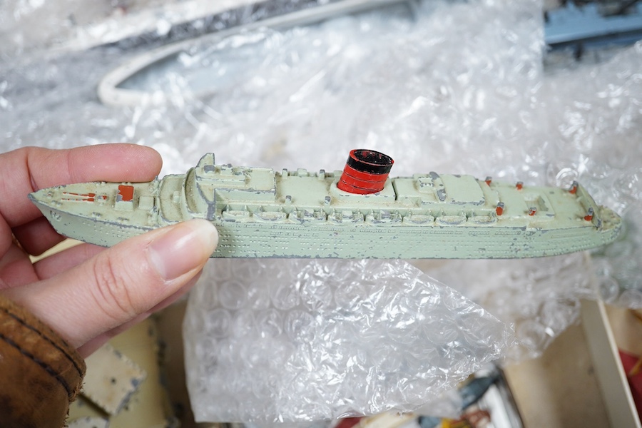 A collection of Tri-ang Minic Ships, contained within an original box for the Presentation Set; M895, S.S. Nieuw Amsterdam, contents includes; a fourth edition catalogue, seven ocean liners, the Royal Yacht Britannia, a